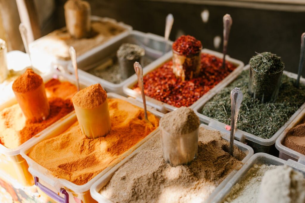 Assorted spices at counter in street market